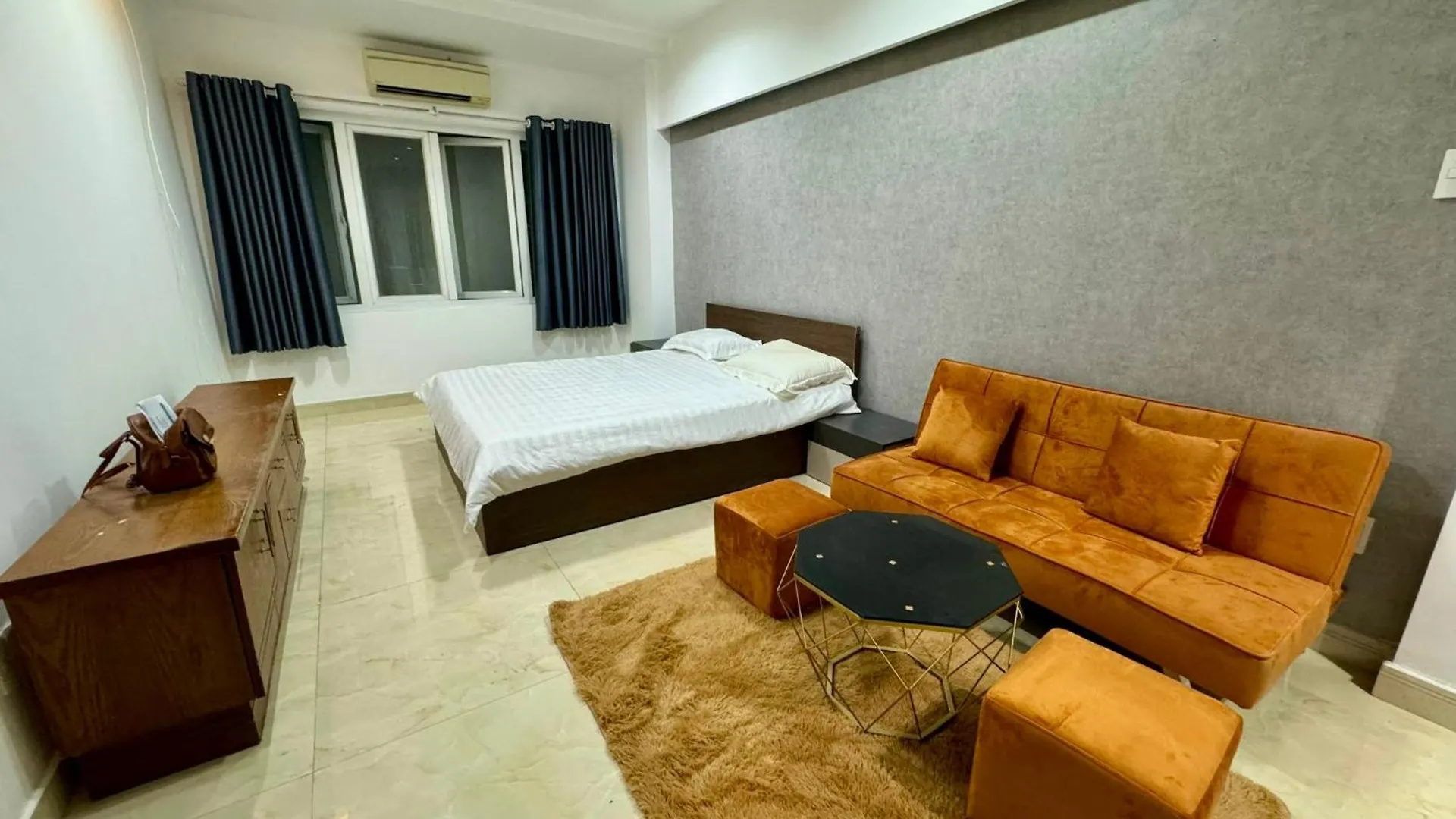 Lägenhetshotell Dlux Hat Giang Ho Chi Minh-staden